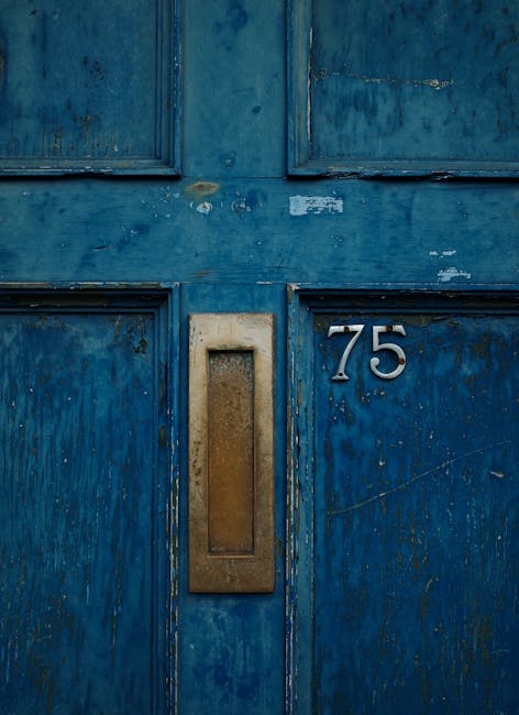 Blue door numbered 75